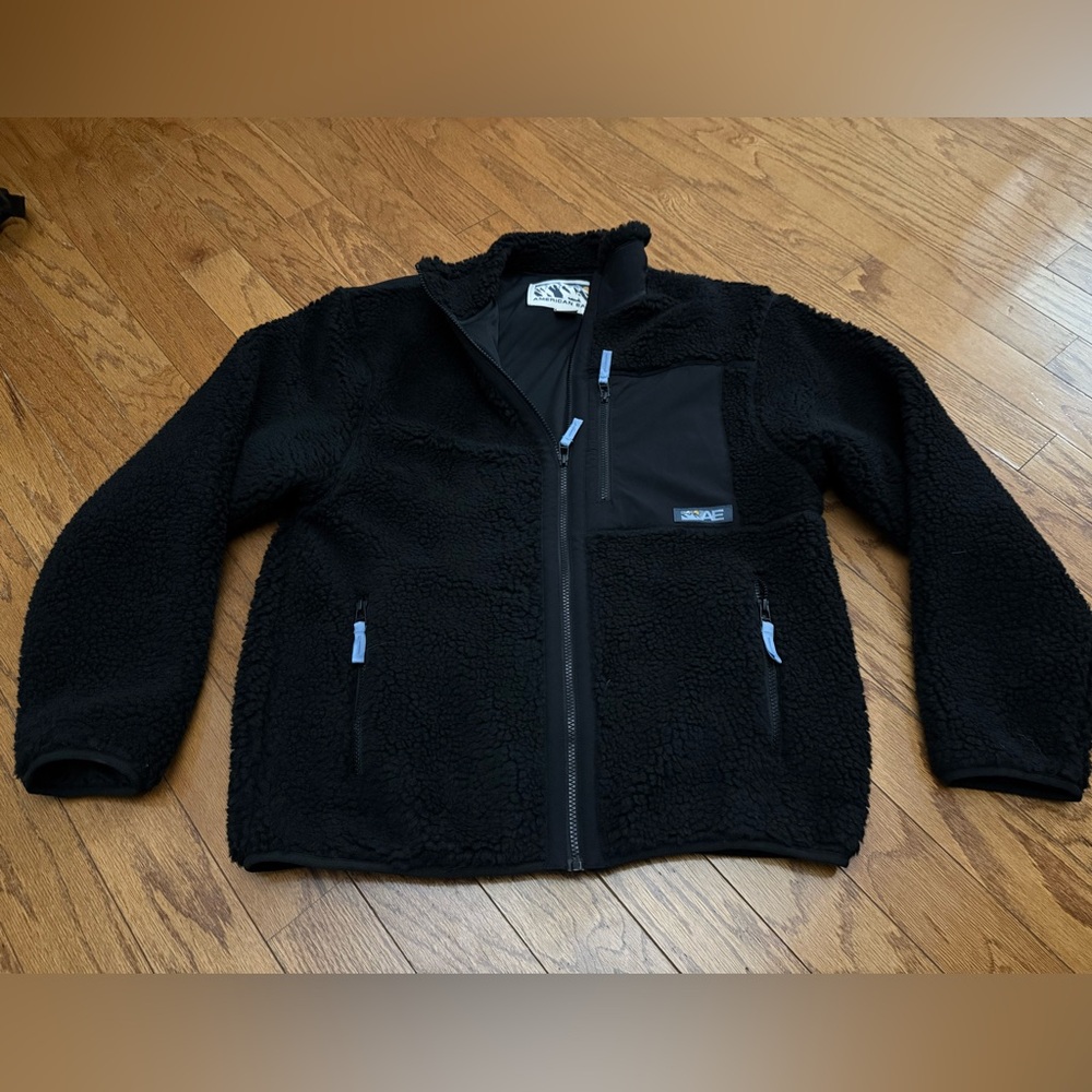 American Eagle Outfitters Black Fleece Jacket with Blue Zip Accent